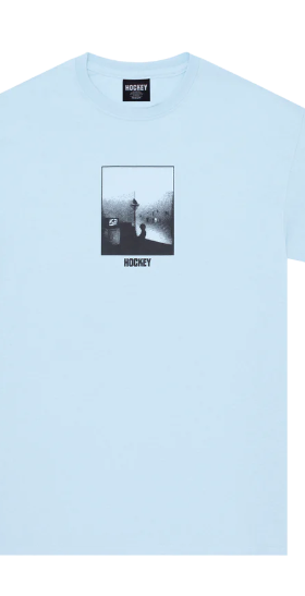 A baby blue Hockey Skateboards t-shirt with a logo and minimalist print
