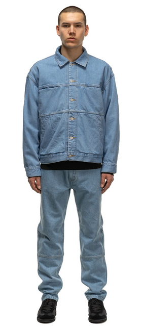 A man wearing a Cav Empt matching denim jacket and pants