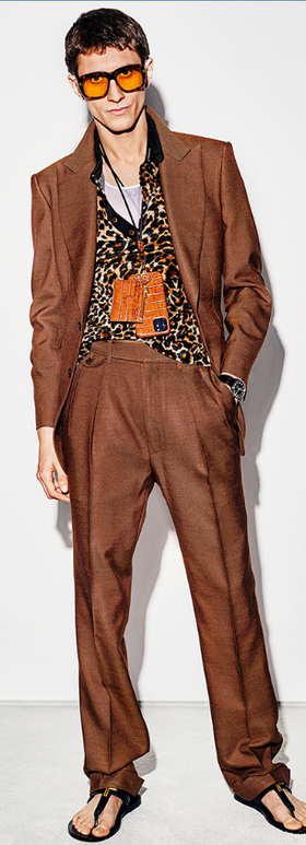 A man wearing a brown vintage-inspired Tom Ford Suit