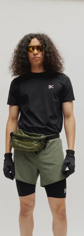 A man wearing ultralight aloe short sleeve black tee