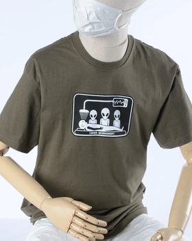 A mannequin wearing olive green abduction t-shirt