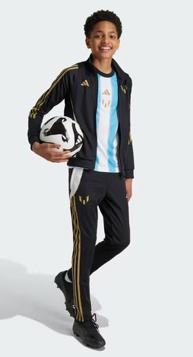 A kid wearing Adidas Kids messi track suit jacket