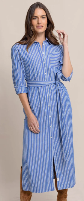 A woman wearing Southern Tide blue lolite farren striped shirt dress