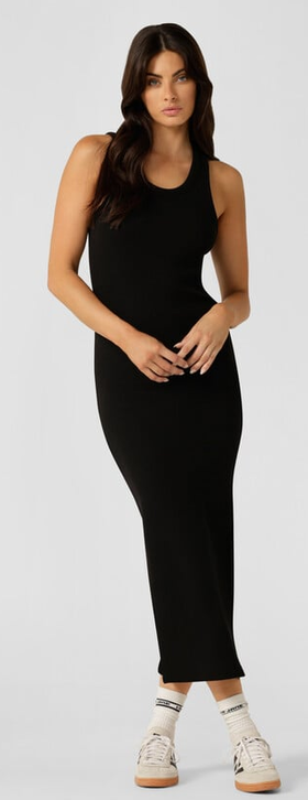 A woman wearing Lorna Jane black color on the move maxi dress