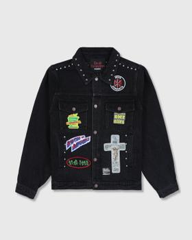 A black studded denim jacket with punk patches from PLEASURES